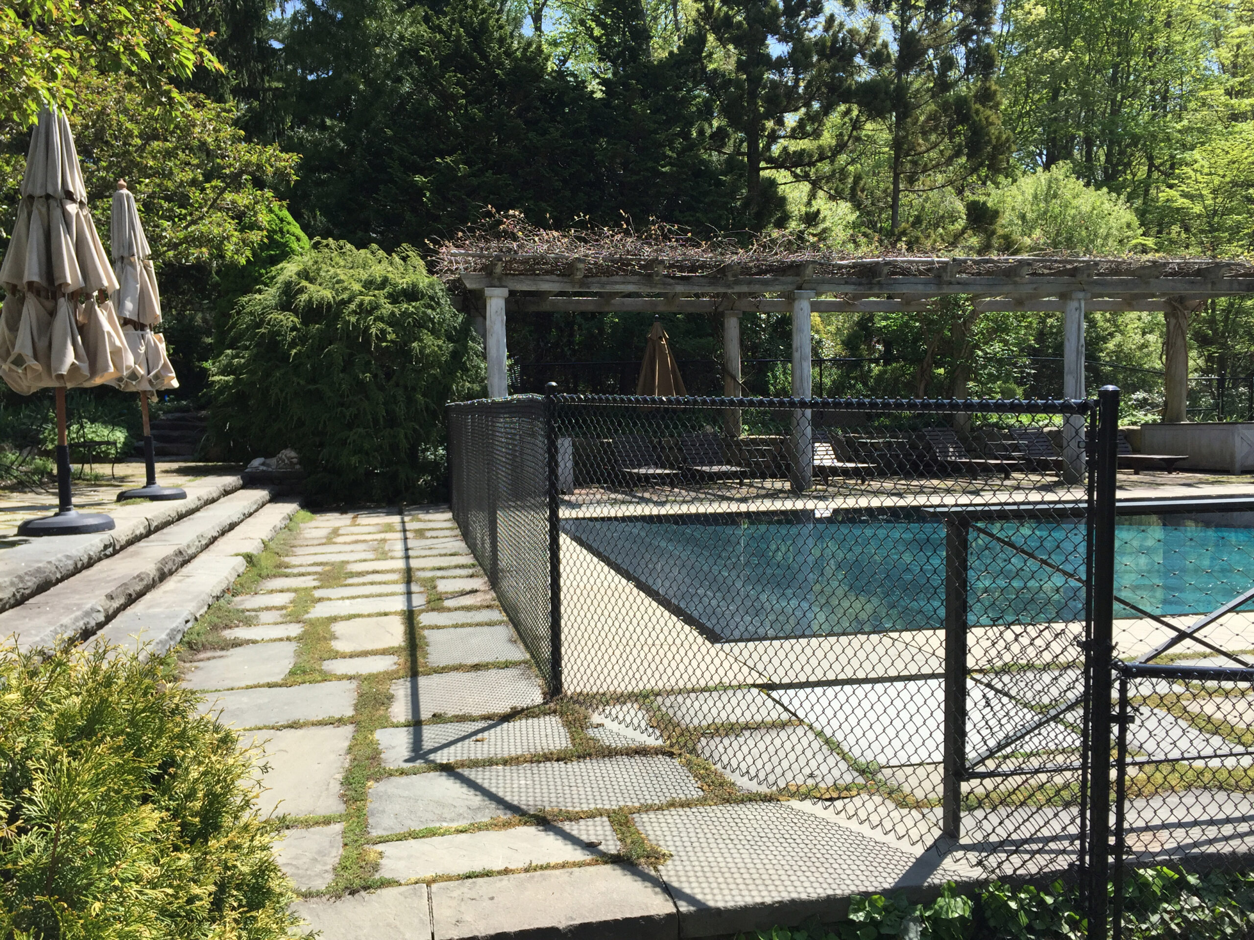 A pool fenced for enhanced safety and reliable installation.